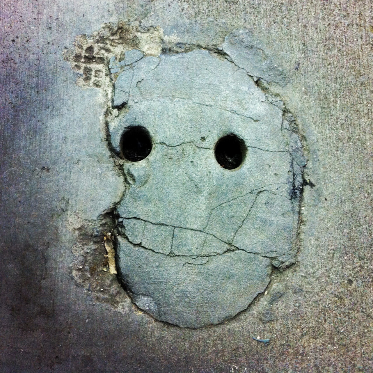 concrete smiley face
